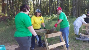 Students digging a STP.